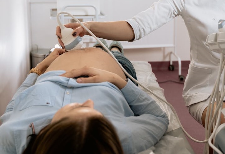 Ultrasound scan being performed on a pregnant woman
